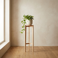 Nolan Tall Stand natural ash counter-height plant stand with bone planter and trailing pothos