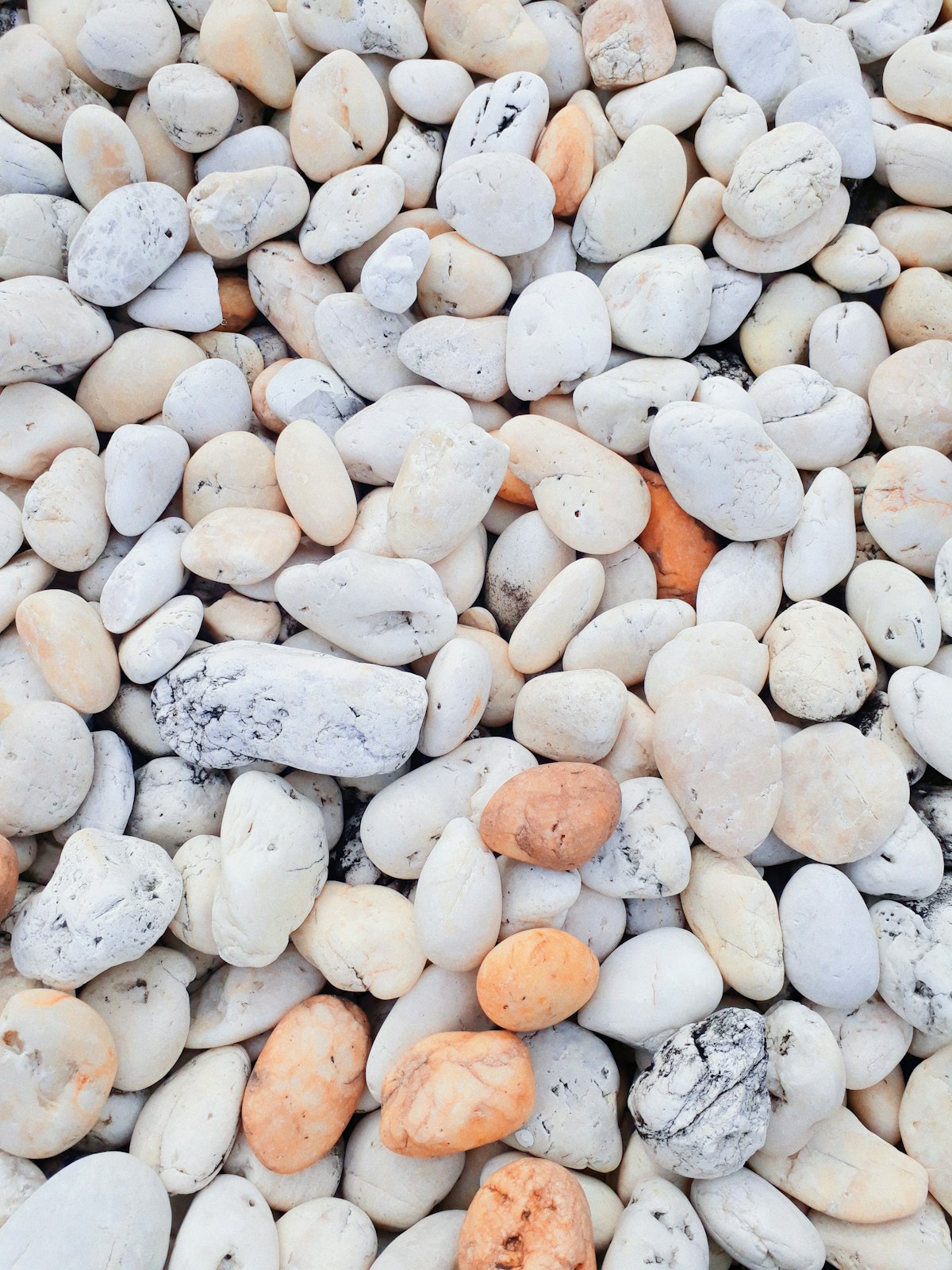 Natural white and cream stones arranged in a decorative display