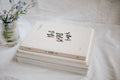Decorative book set styled on marble coffee table