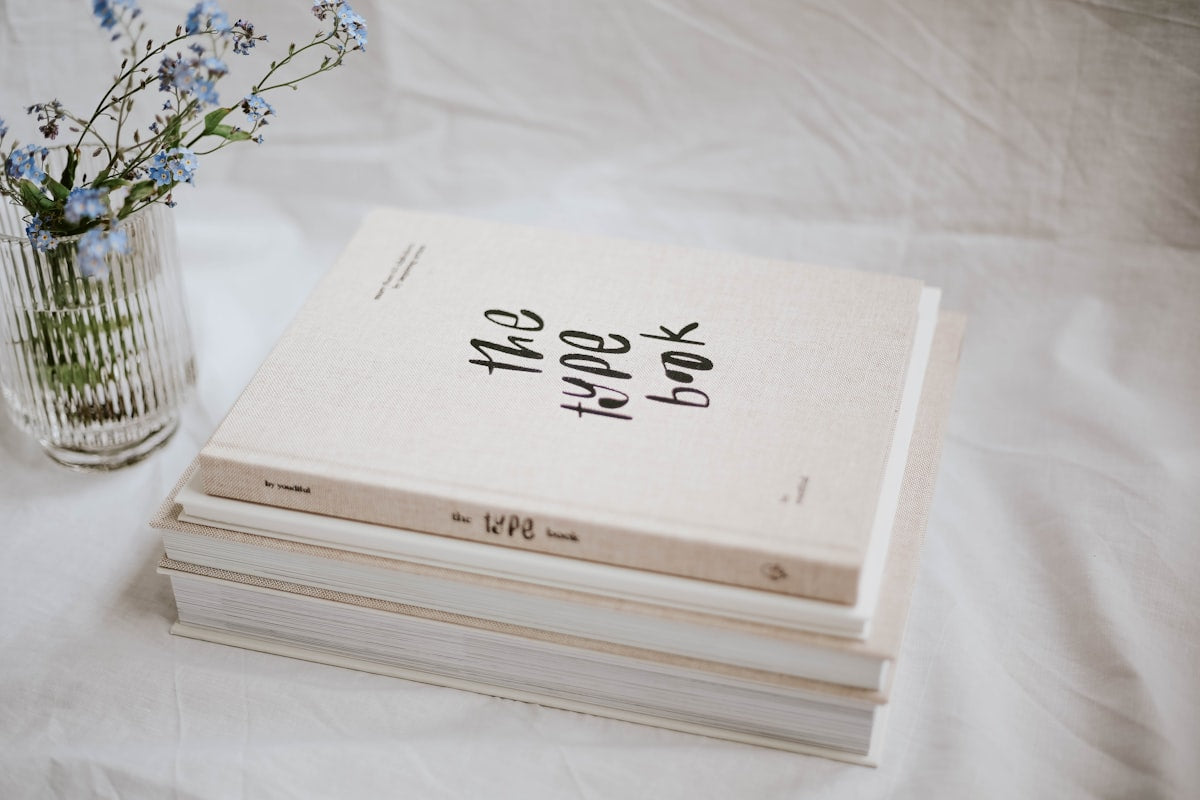 Decorative book set styled on marble coffee table