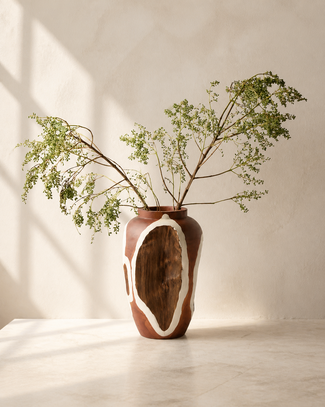 Agatha natural teak root sculpture in warm directional light.