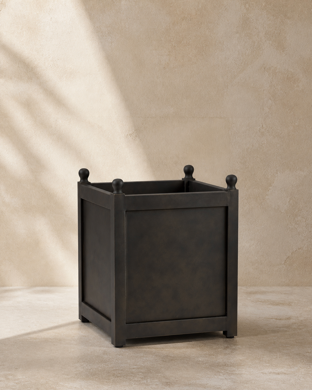 Black Arcadia framed square planter with four ball finials.