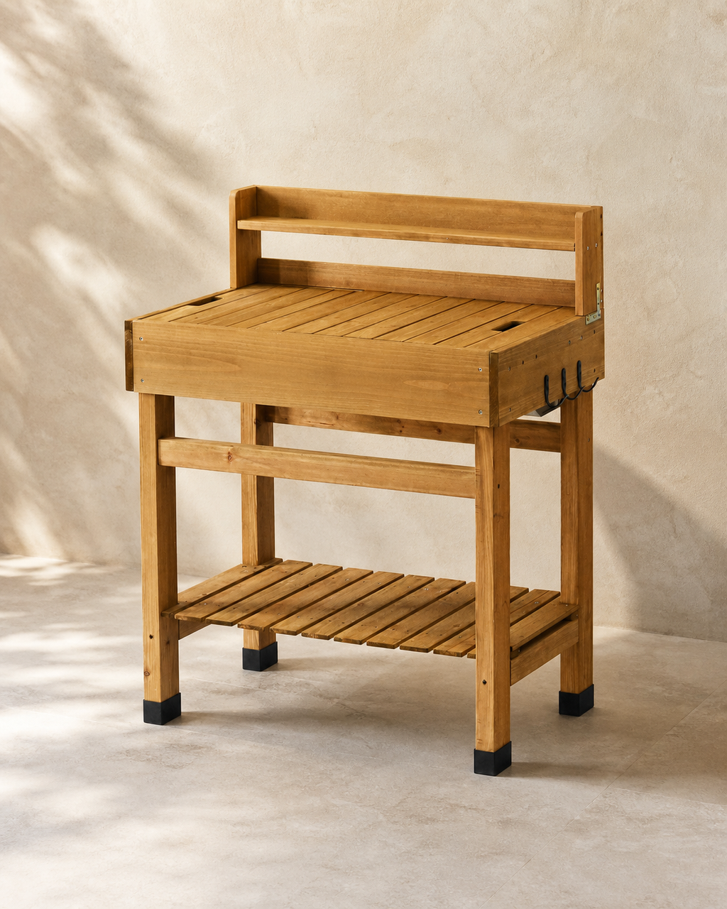 Cedar garden workstation with raised shelf, hooks, and lower slatted storage.